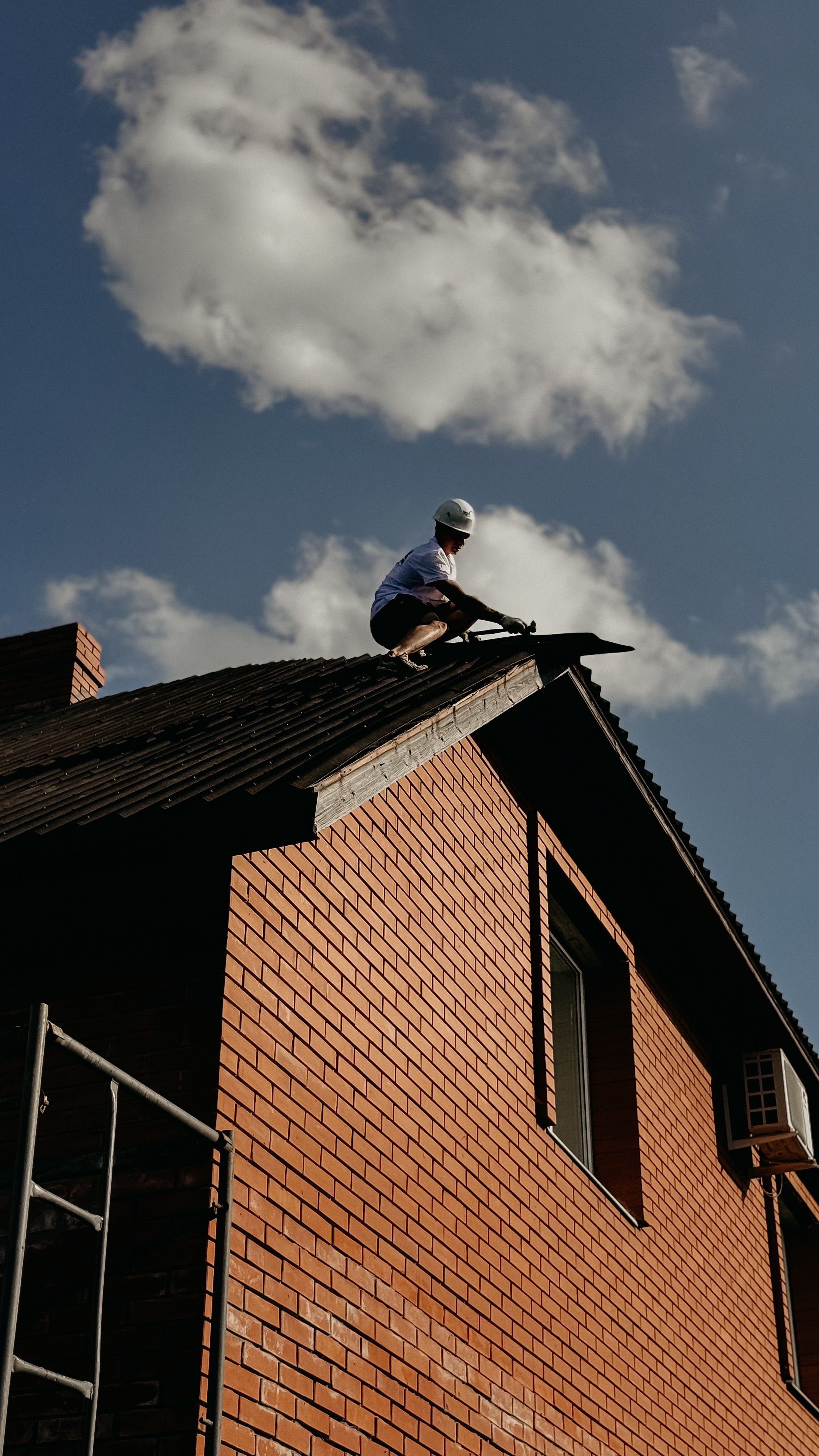 Man Working On Roof